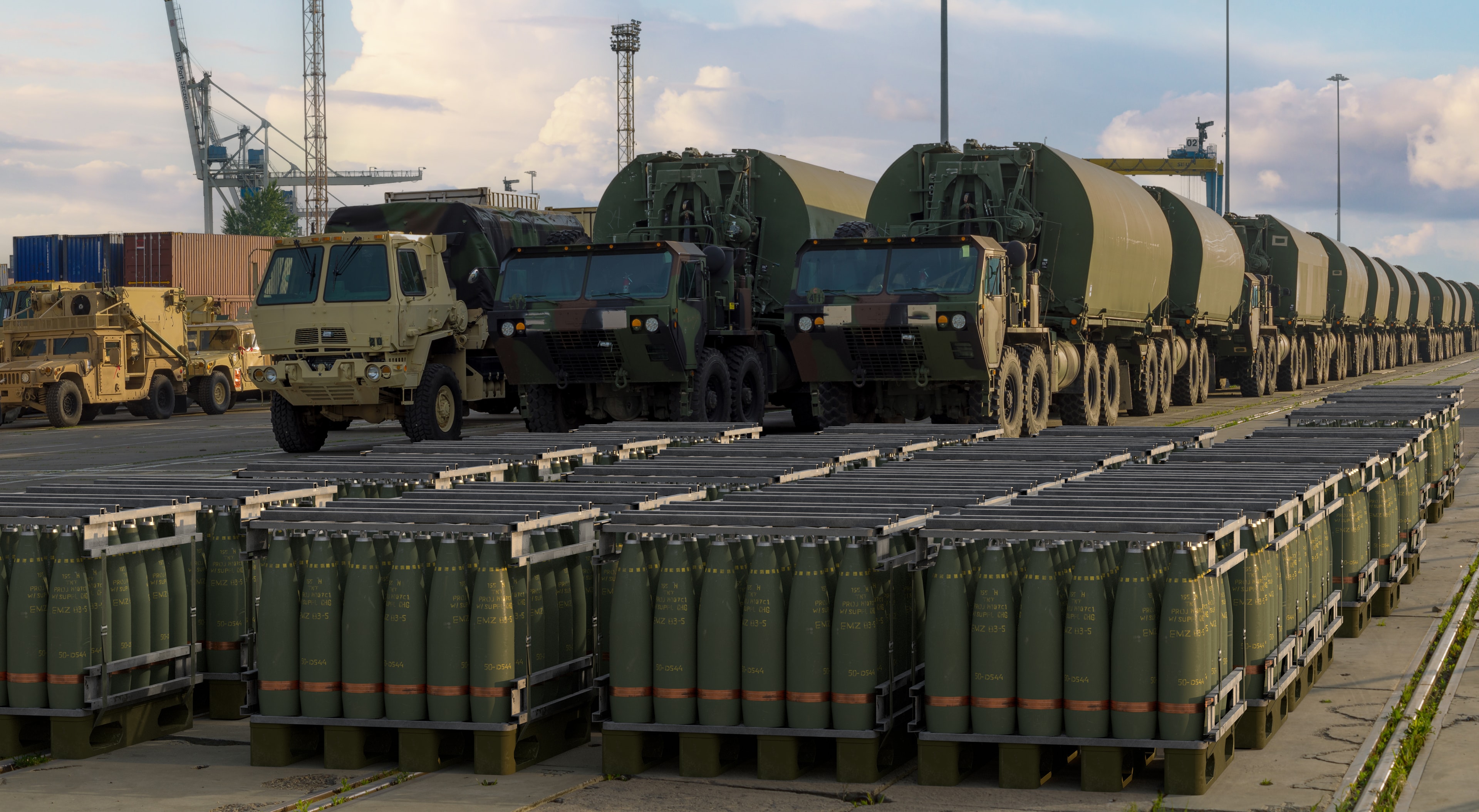 NATO military spare parts warehouse with NSN-labelled aviation and ground vehicle components